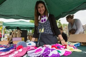 woman by knit stall