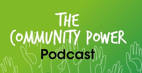 The words community power podcast on a green background with hands raised