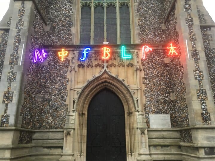 A string of colourful lights hung across St Mary's church entrance