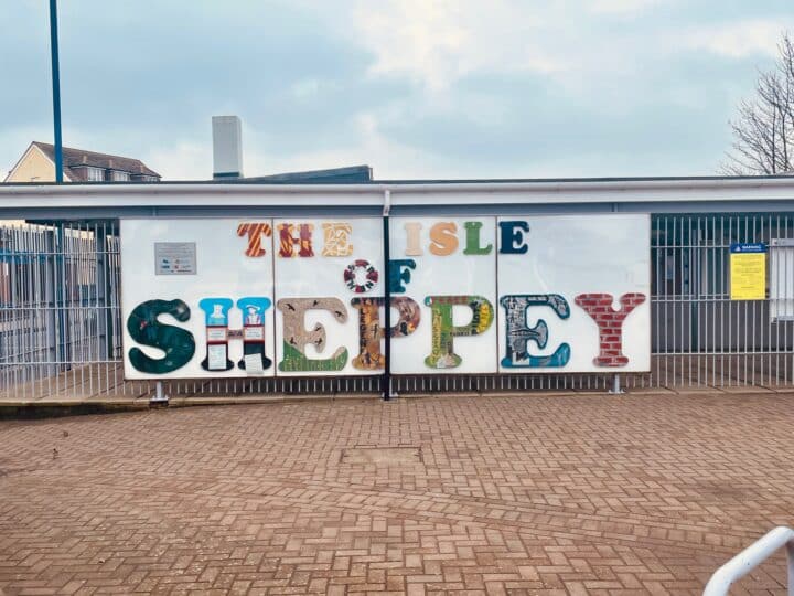 A wall of art on a building.
