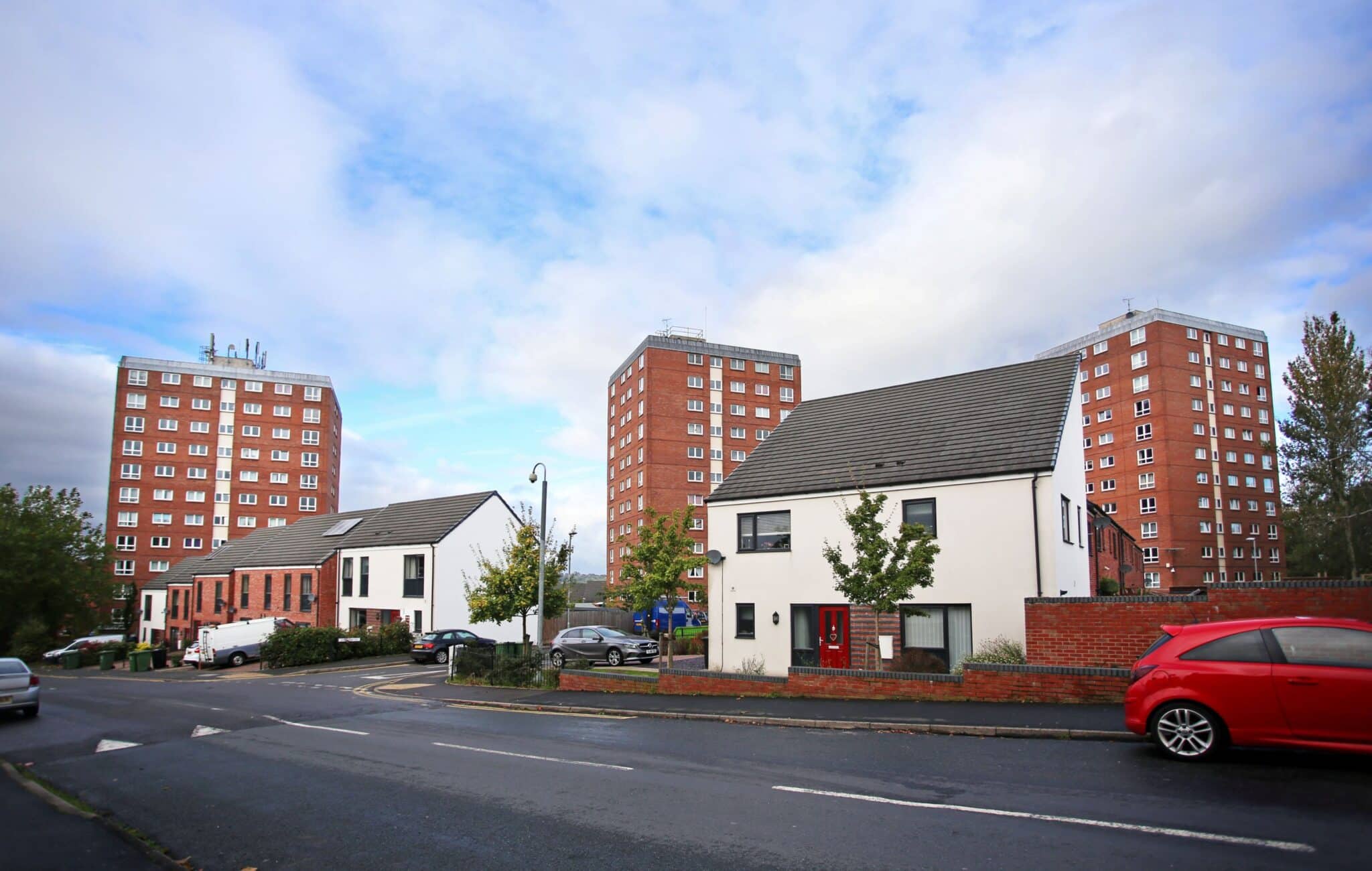 A residential neighbourhood in Kidderminster, the home of DY10 Big Local, showing a mix of housing including modern terraced homes and high-rise tower blocks.